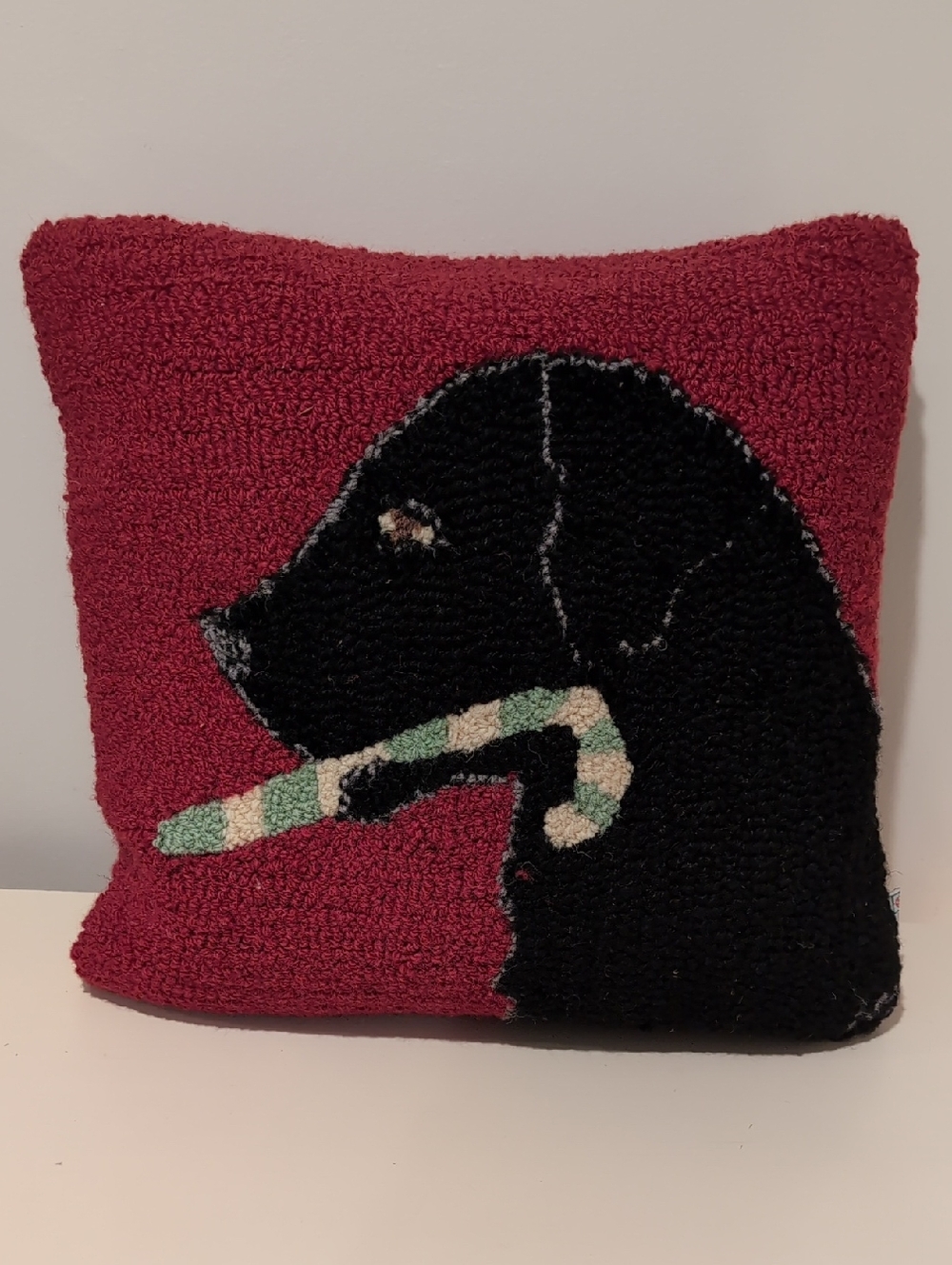 Holiday Black Labrador Dog Holding A Candy Cane Hooked Pillow
